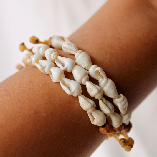 Trumpet Shell and Juniper Bead Bracelet on Hand Braided Sinew